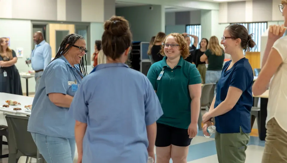 UNE students mingle with the residents of the Maine Correctional Center. 